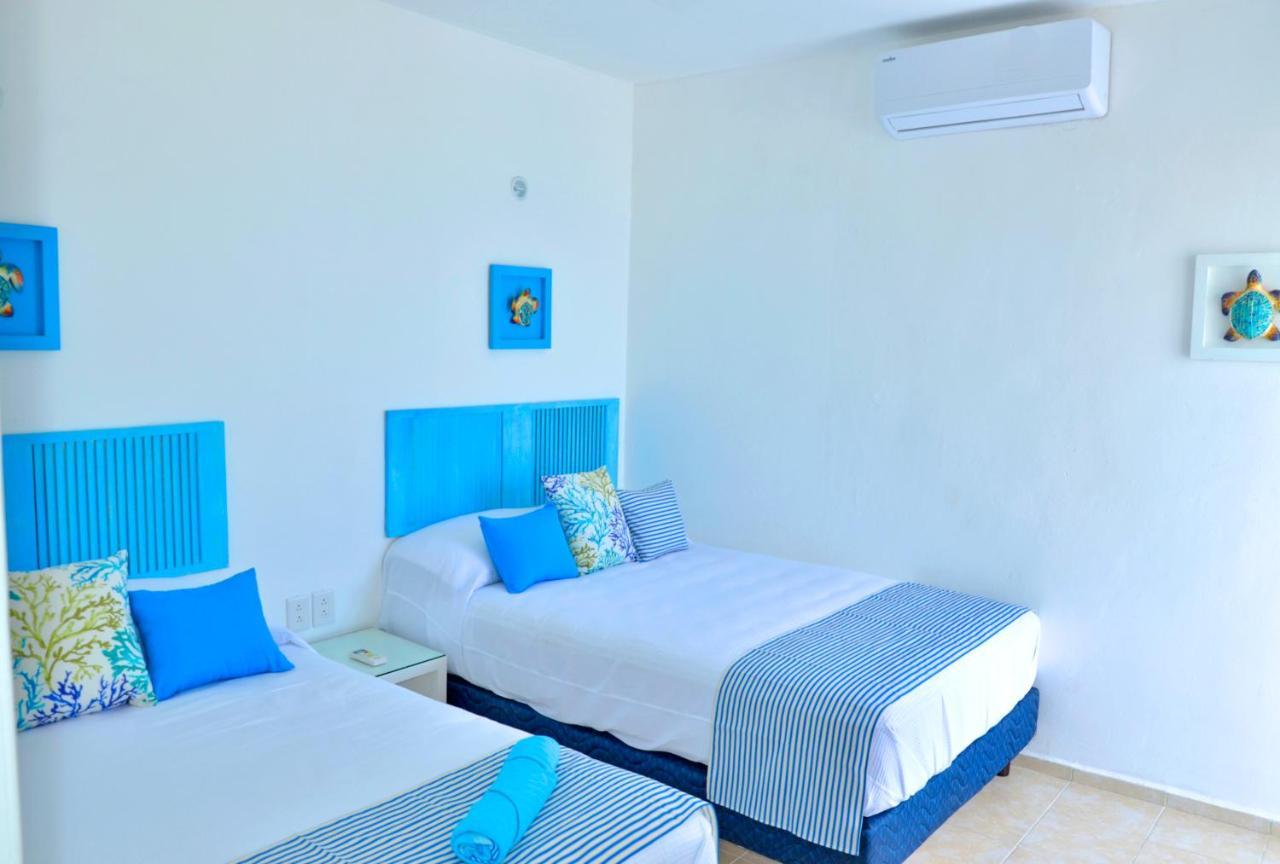 Ar Ocean View Apartments Isla Mujeres Bagian luar foto