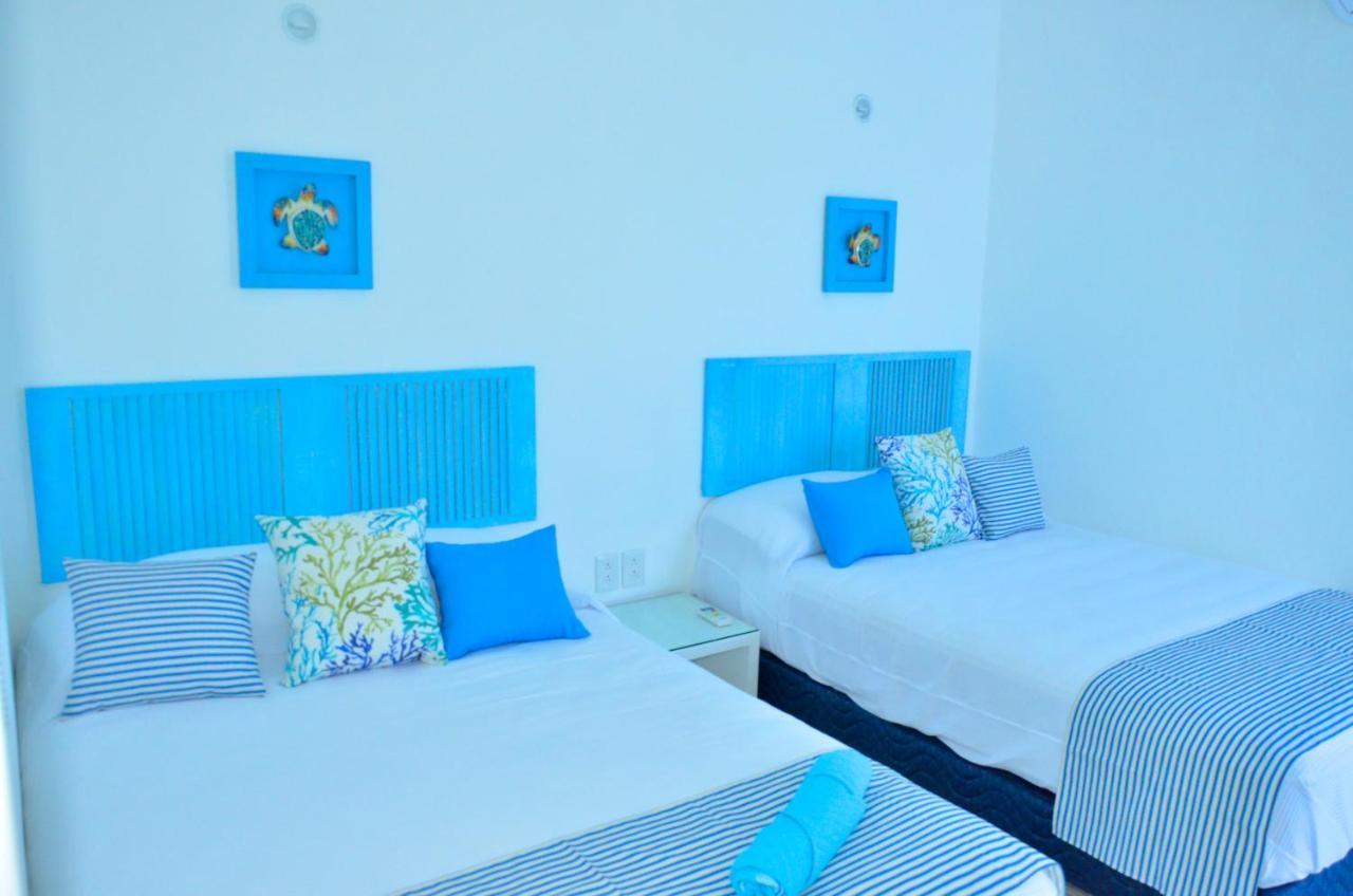 Ar Ocean View Apartments Isla Mujeres Bagian luar foto